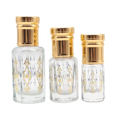 China 3ml 6ml 12ml High Quality Gold Arabian Oud Perfume Essence Oil Glass Bottle With Glass Stick for sale