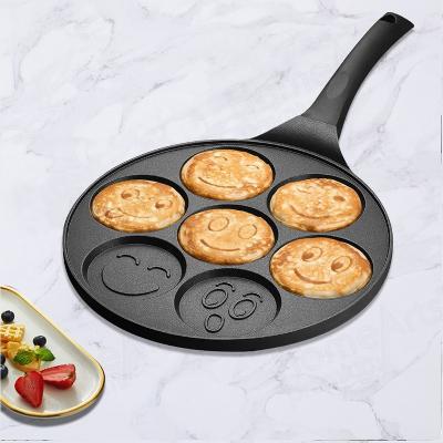 China Sustainable Factory Price 26cm Kitchen 7 Holes Egg Cooking Non Stick Frying Smiley Pancake Pan for sale