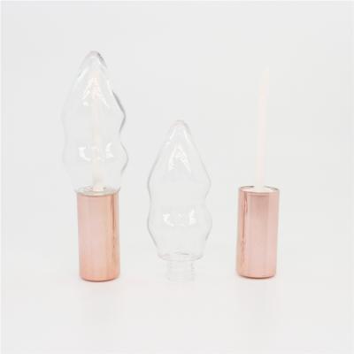 China New Transparent Lip Gloss Cosmetics Lip Shaped Lip Gloss Tube Fashion Empty Bottle Case for sale