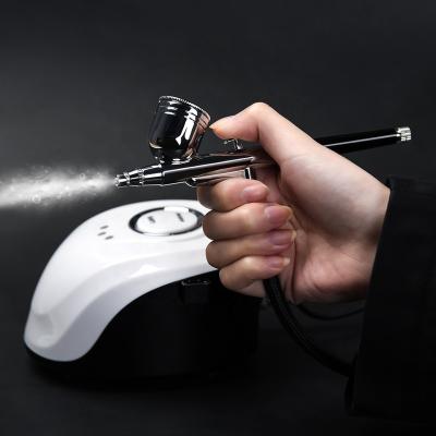 China Makeup Mini Airbrush Air Compressor Universal Kit, Portable Dual Action Cake Decorating Spray Gun Airbrush Set for sale