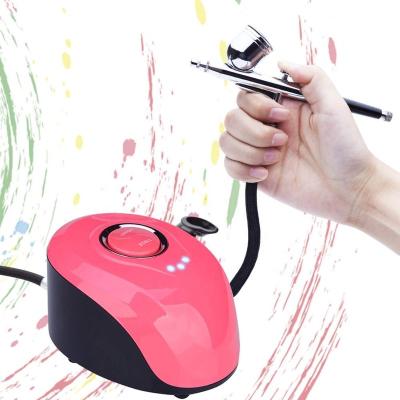 China Makeup Paint Airbrush Kit for Painting with Mini Air Compressor for Nail Tattoo Cake Decorating Body Art Model for sale