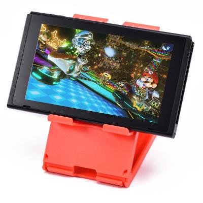 China Foldable Place Switch Console Stand Dock For Nintendo Switch Adjustable Multi-Angle Stand Base Bracket for sale