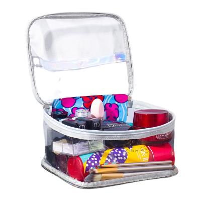 China Portable Large Capacity PVC Cosmetic Transparent Makeup Bag Lady Bag Waterproof Toiletry Bag for sale