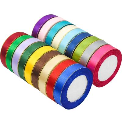 China Current Wholesale High Tenacity 22 Meters Per Roll 2 Cm Polyester Gold Glitter Yarn Metallic Satin Ribbon for sale