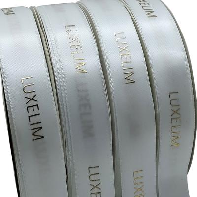 China Custom Recyled Good Quality Gift Ribbon Brand Logo Printed Band 1 Inch 25 Mm 3D Gold Hot Stamping Satin Printed Ribbon for sale