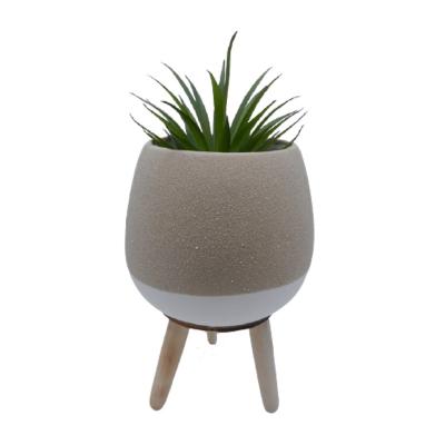 China Ceramic Modern Flower Pot Potted Modern Artificial Succulents Plants With Wooden Leg for sale