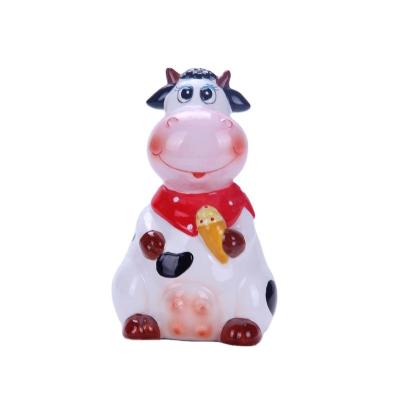 China Creative Piggy Bank Design Cow Shaped Ceramic Money Savings Bank for sale