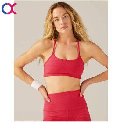 China Logo Workout Custom Slim Running Racerback Gym Strappy Yoga Shockproof Bra Sports Bra Tops for sale