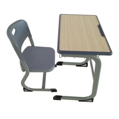 China Modern Ergonomic Study Table Desk And Chair Set For School Students for sale