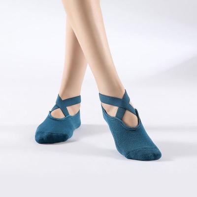 China Breathable Professional Cross Strap Yoga Booties Non-slip Female Pilates Booties Non-slip Training Socks for sale