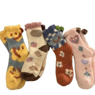 China The Other Cute Flower Pattern Coral Velvet Winter Socks Smiling Face Design Sleep Socks for sale