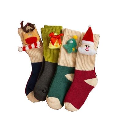 China Other Design Festive Socks Kids Christmas 3D Santa Claus Doll Socks Holiday Gifts for sale