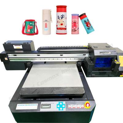 China Genuine China DX7 DX5 Mini Flatbed Uv Printer Uv Printers China 6090 Three Heads for sale