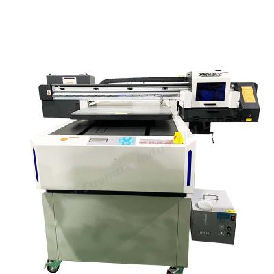 China Hot Selling Bottles Flatbed A4 A3 A2 A1 6090 UV Printer Hotels 6040 UV Hybrid Printer for sale