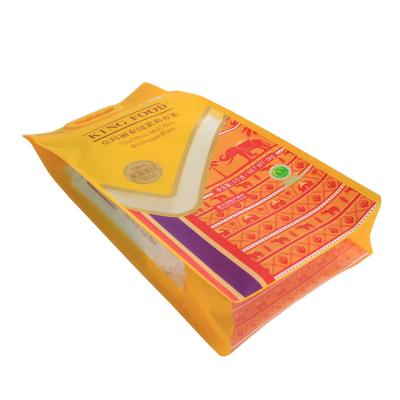 China Moisture Proof Material 1kg 2kg 5 Kg Thailand High Quality Plastic Laminated Yellow Dyed Rice Packing Bag With Plastic Handle for sale