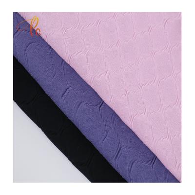 China Beautiful Custom Embossing High Quality 100% Pure Polyester Crepe Fabric Tulle Fabric 100% Pleat Dyed Fabric for sale