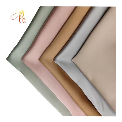 China Good Quality Plain Dull Face Stretch Wedding 100% Polyester Satin Tear-resistant Fabric For Dress for sale