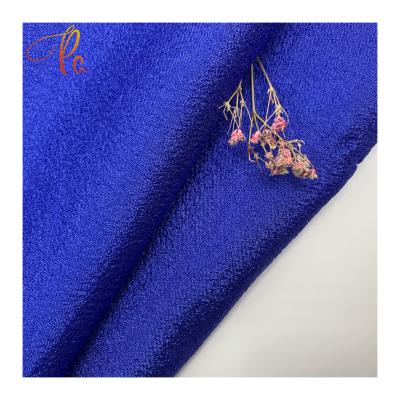 China Anti Pill Shaoxing Textiles Polyester Organza Crepe Fabric Tulle Pure Color For Dress Organza Fabric for sale