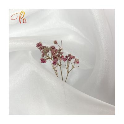 China Pure In Stock Good Price 100 Polyester Fabric Organza Fabric Polyester For European Wedding Organza Fabric for sale