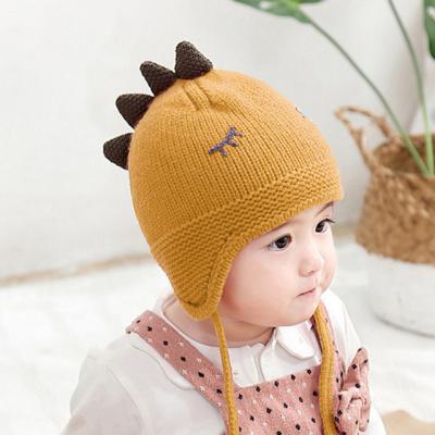 China COMMON Baby Dinosaur Beanie Embroidered Earflap Winter Kids Knit Hat for sale