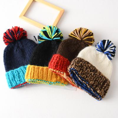 China Custom Thick Beanie Hats Women Autumn And Winter Knit Hearing Protection Beanie Pom Pom Hats Warm for sale