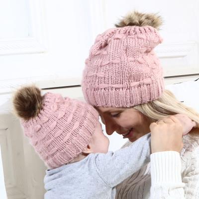 China COMMON JOINT MOM and BABY matching hats knitted mohair pom pom women and kids winter beanies hat for sale