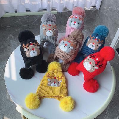 China Warm Quality Fuzzy Fur Pom Pom Kids Beanie Hats Cute Fashionable High Quality Soft Faux Baby Knitted Winter Hat for sale