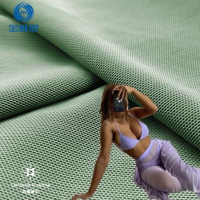 China Stain Repellent China supplier 190g 70d*280d 85 nylon 15 spandex mesh knitted fabric can be customized printed for swimwear for sale