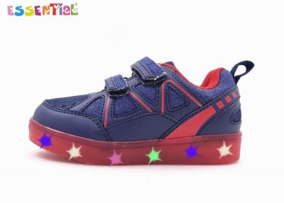 China El LED enciende para arriba las zapatillas de deporte/los calzados informales Outsole translúcido de los niños dos correas de la hebilla en venta