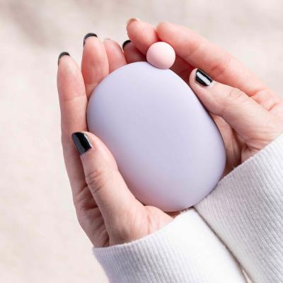 China Eco-Friendly Reusable Pocket Winter Silicone Warm Wrap Heat Pack Hand Warmer Hand Warmer Contains Natural Heating Warm Wrap for sale