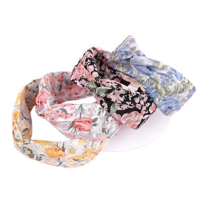 China Small flower European retro Hong Kong style French cute hair circle cross knot female national h style cloth art hair clip and American for sale