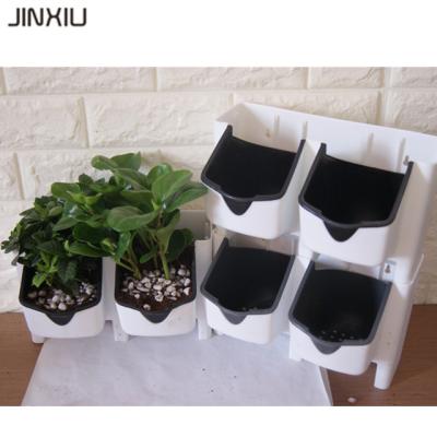 China Best selling eco-friendly color can be used for stacking flower pots/vertical wall flower pot/outdoor stacking garden flower pots for sale