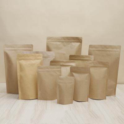 China Multi Sizes Food Smell Proof Kraft Paper Bags Heat Sealing Ziplock Pouches Eco-friendly Metallic Mylar Packaging Bags With Tear Notch for sale