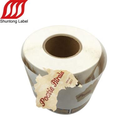 China Waterproof Special Custom Emboss Logo Sticker Label Metal Paper Wine Bottle Sticker Roll for sale