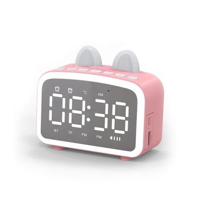 China Hot Selling Plastic Mini Alarm Clock Night Light Glowing Speaker With Stand for sale