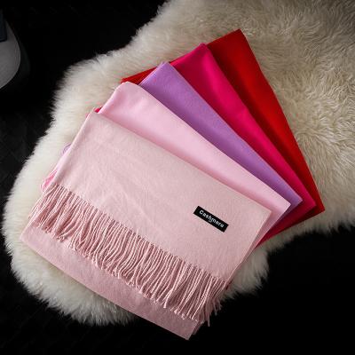 China Hot British Style Eco-friendly Imitate Cashmere Plaid Scarf New Design Unisex Plain Color Cashmere Mixed Knitted Tassel Scarf With Tassel for sale