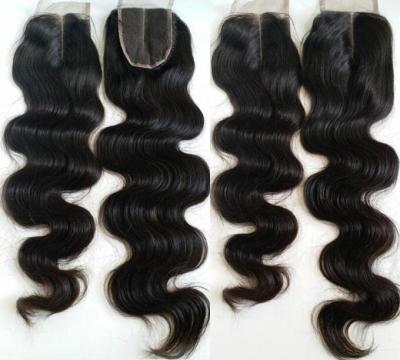 China Hair Stock 100% Virgin Hair Body Wave Lace Closure 4x4 Hair Closures With Natural Hairline Bleached Knots for sale