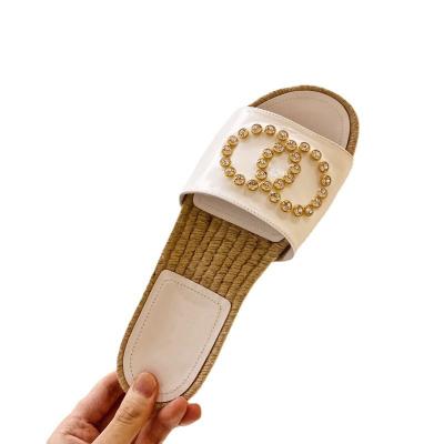 China Fashion trend new Tixu designer shoes women famous brands summer letter sandals for women to use luxury flat heels for sale