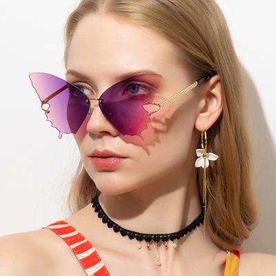 China 2021 Oversized Fashion Sunglasses FuQian New Arrival Designer Trendy Rimless Gradient Glass Butterfly Women Shades Sunglasses for sale