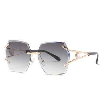 China New Gradient Sunglasses 2021 Fashion Bling Metal Sunglasses Ocean Women Female Eyewear Glass Rimless for sale