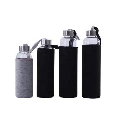 China Sustainable Easy Carrying 420ml Glass Water Bottle Custom Logo With Stainless Steel Lid And Rope for sale