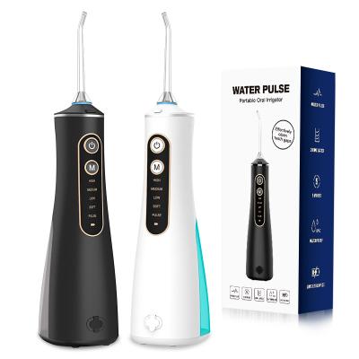 China Outdoor Portable Wireless Flosser Water Pick Portable Oral Dental Irrigator With Replaceable Spray Tips for sale