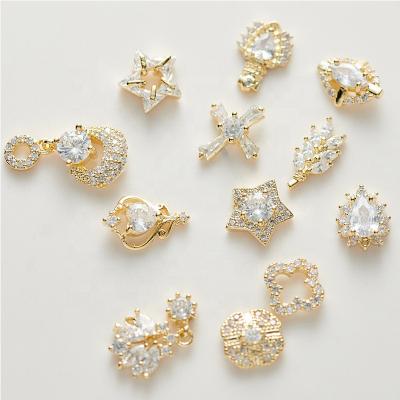 China Nail Art Jewelry Alloy Cross Nail Art Diamond Gem Pendant Nail Decoration Nail Art Diamond Real Zircon Gold Plated Zircon Art Charms 3d Nail for sale