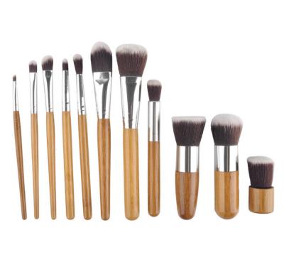 China Angular Blush Private Label Handle 11 Pcs Professional Cosmetic Bamboo Makeup Brush Case With Cloth Bag for sale