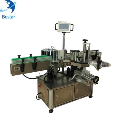 China Automatic Food Bottle Sticker Labeling Machine For Small Flat Round Plastic Glass Bottle for sale