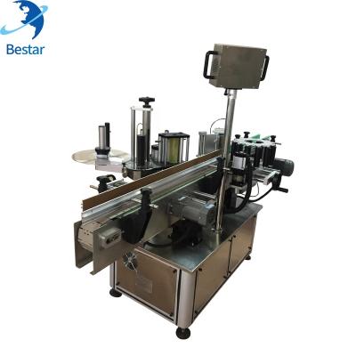 China Automatic Food Beer Bottle And Labeling Machine For Round Bottle Glass Adhesive Machine for sale