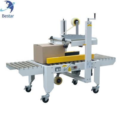 China Food Crate Cardboard Tape Sealer Cardboard Box Strip Sealer Machine Type Sealing Machine for Carton for sale