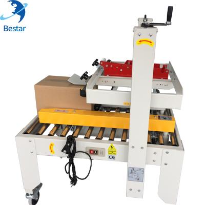 China Food Crate Box Cardboard Band Sealer Cardboard Box Strip Sealing Machine for sale