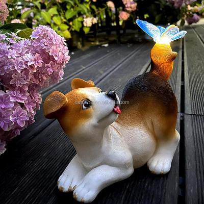 China Solar Europe Garden Dog Statue Figurine Resin Dog Sculpture Figure Landscape Decoration with Butterfly Ornament for Garden Decor for sale