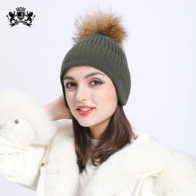 China Winter COMMON Unisex Acrylic Janefur Ski Cap Custom Label Skull Hats Knitted Beanie With Pom Pom for sale